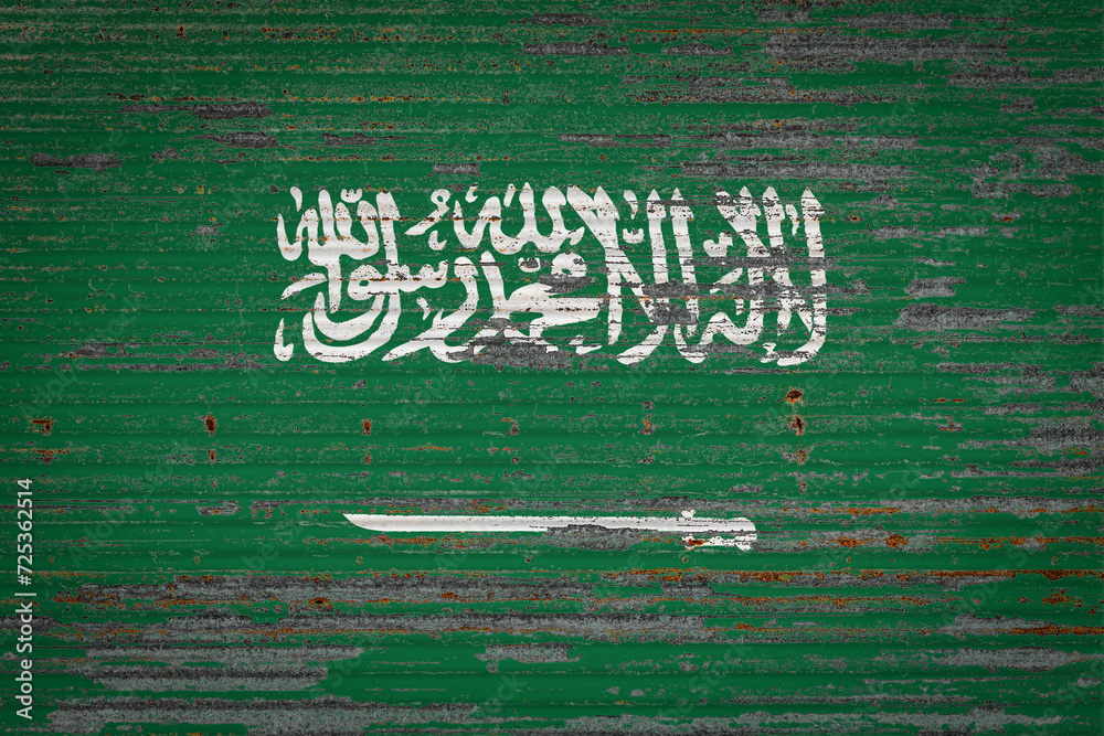 Φωτογραφία Close-up of old metal wall with national flag of Saudi Arabia