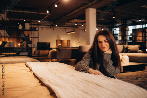 Customer woman buying new furniture - bed in a store supermarket mall store