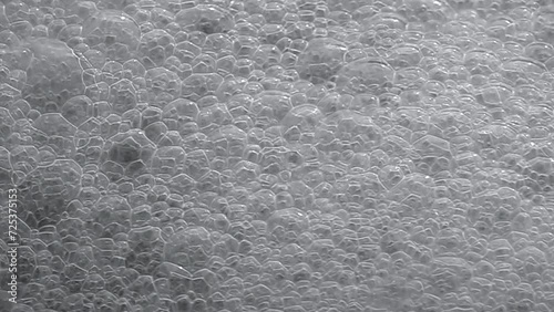 Group of bubbles moving on a water slow motion photo