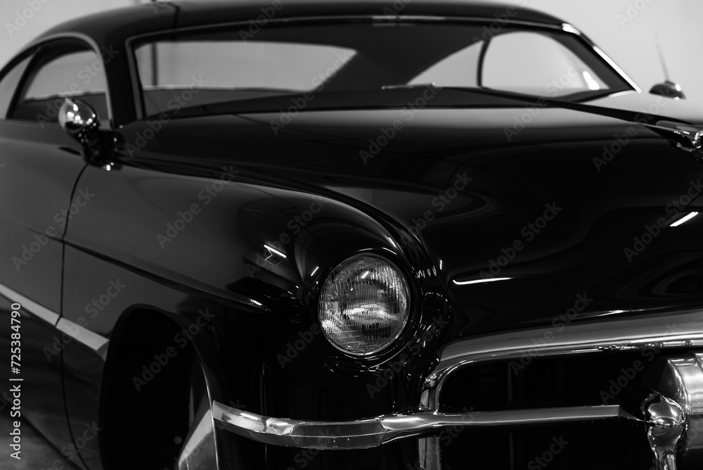 Close up shot of a black retro car