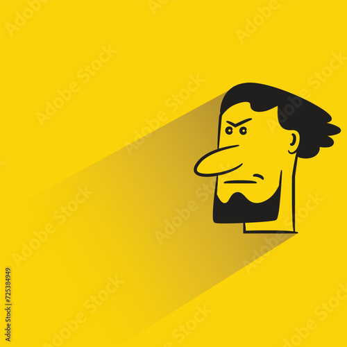 angry face icon with shadow on yellow background