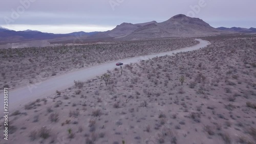 Drone footage following Dodge Challenger near Red Rock Canyon, United State
