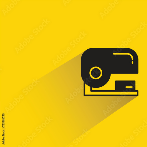 stapler icon with shadow on yellow background