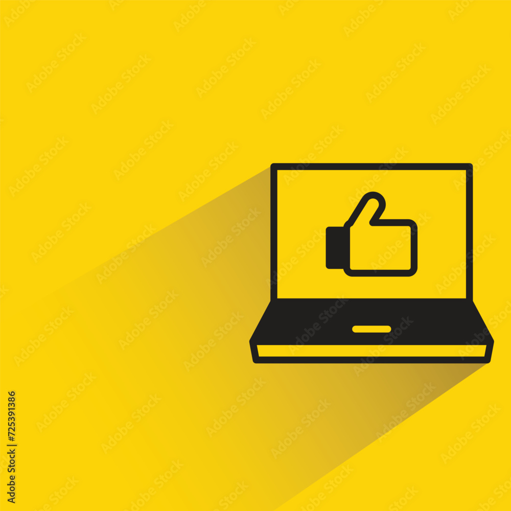 laptop and thumb up icon with shadow on yellow background