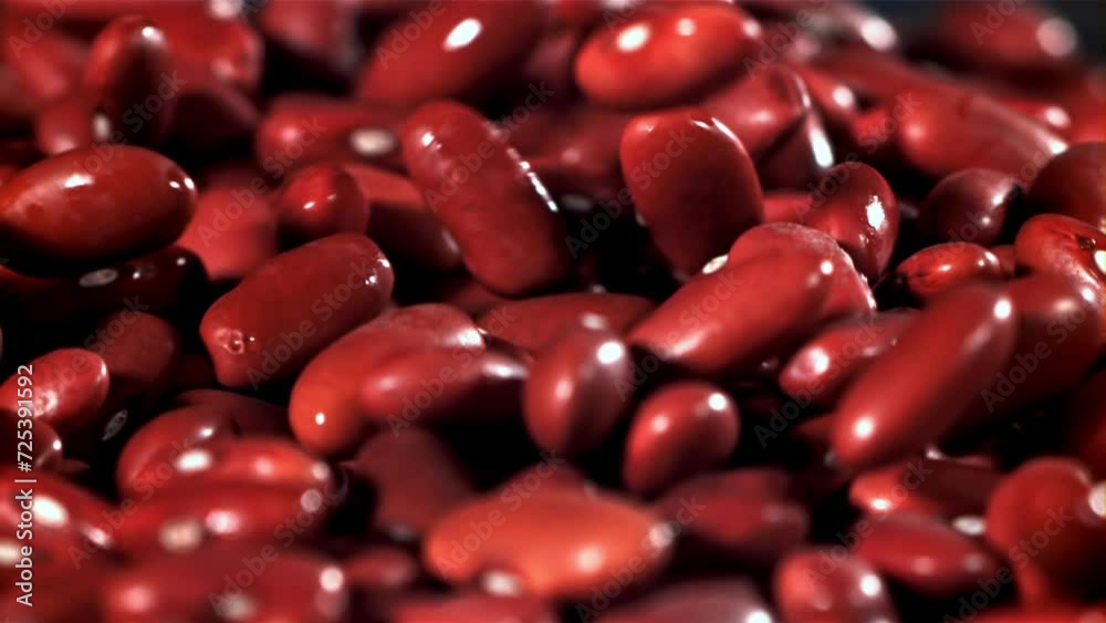 The fall of red beans. Filmed on a high-speed camera at 1000 fps. High quality FullHD footage The fall of red beans. Filmed on a high-speed camera at 1000 fps. High quality FullHD footage