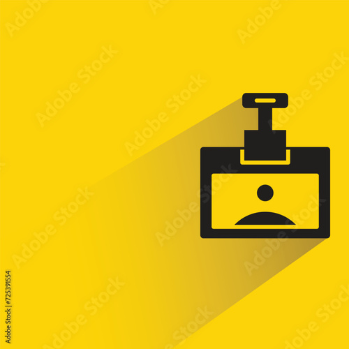 id and business card with shadow on yellow background