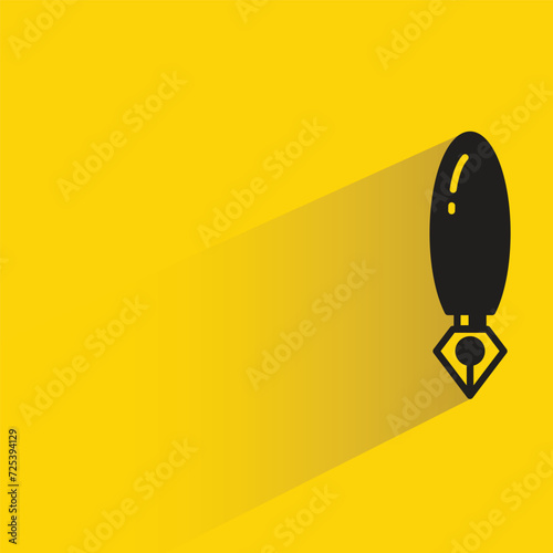 fountain pen icon with shadow on yellow background