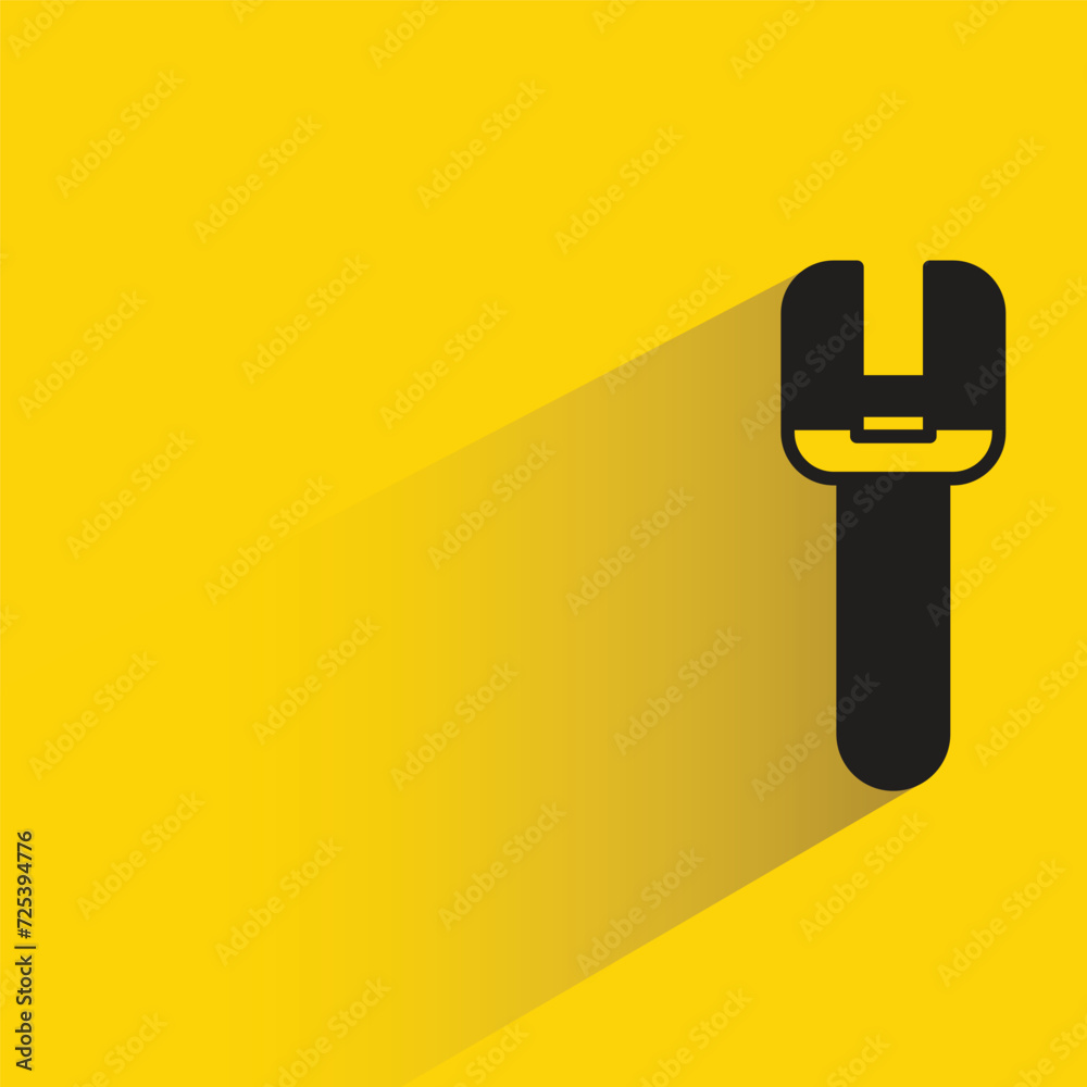 wrench icon with shadow on yellow background wrench icon with shadow on yellow background