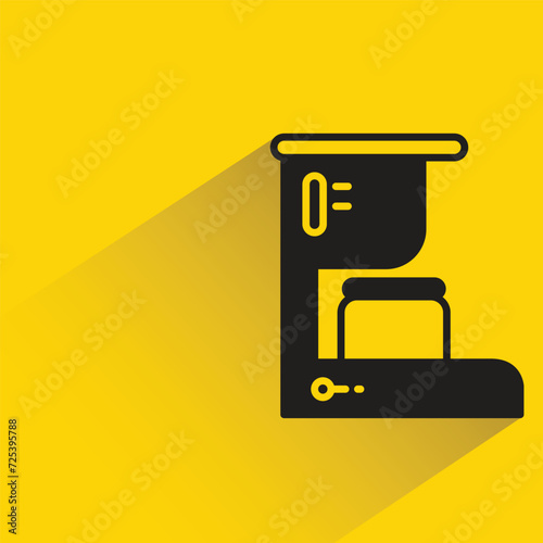 coffee machine icon with shadow on yellow background