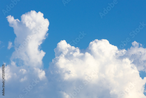 Scenic view of white fluffy clouds in the blue sky