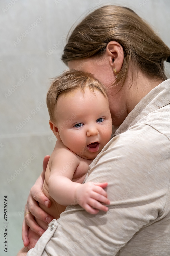 Nurturing Bonds: A Tender Embrace Between Mother and Child