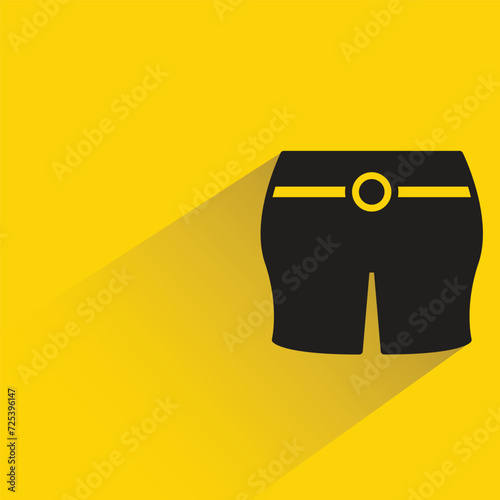 short pant icon with shadow on yellow background