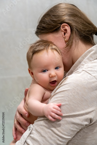 Nurturing Bonds: A Tender Embrace Between Mother and Child