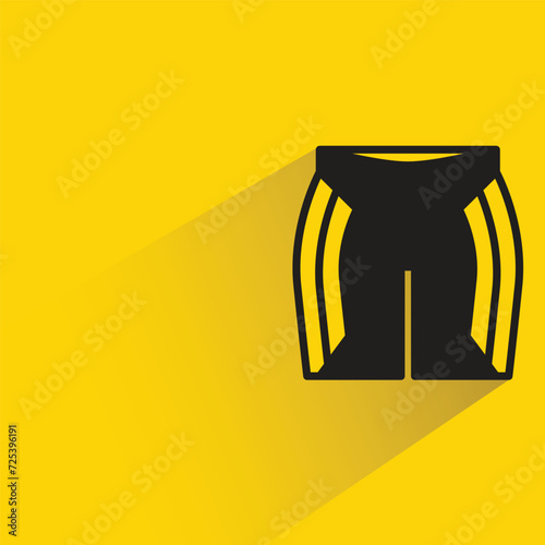 short pant icon with shadow on yellow background