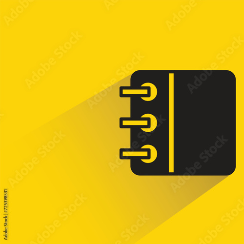 notebook icon with shadow on yellow background