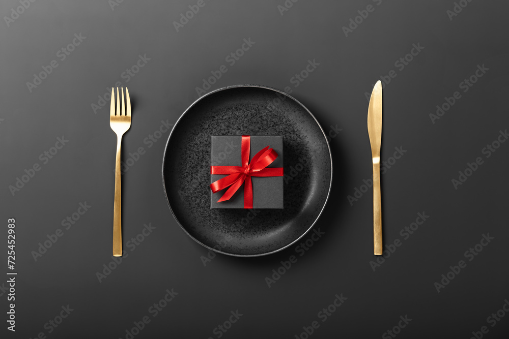 Beautiful romantic table setting on dark background top view Beautiful romantic table setting on dark background top view
