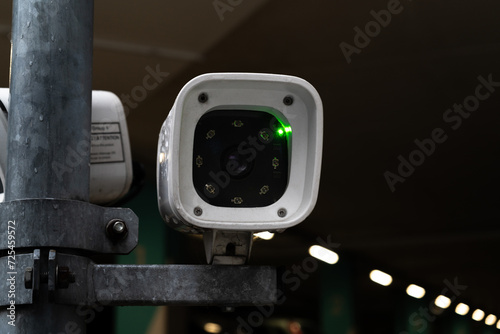 License plate reader, automatic number recognition, digital surveillance camera, boom barrier gate. Smart parking lot entrance pass automation. Vehicle access control. Car park identification system.