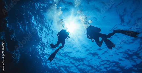 Scuba diving, underwater or diver swimming and exploring for marine adventure, hobby or vacation activity. Beautiful, blue and clear calm ocean view for travel, exploration or environmental discovery