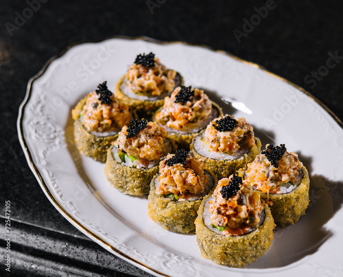 Warm sushi rolls with tempura cream cheese