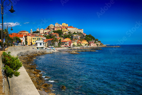 Coastal townscape with traditional colourful buildings, Diano Marina, Imperia, Liguria, Italy photo