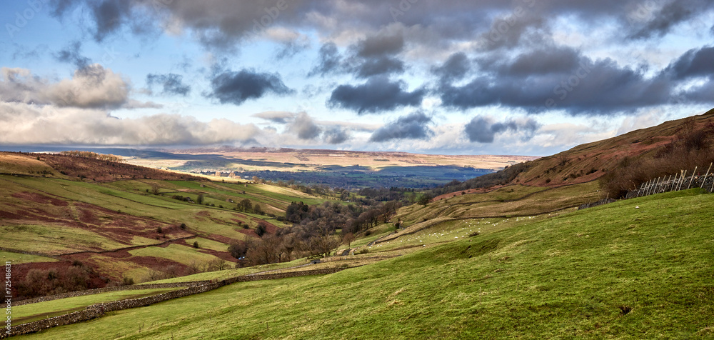 View looking north towards Wensleydale across West Burton from the single tracked road to Walden in North Yorkshire