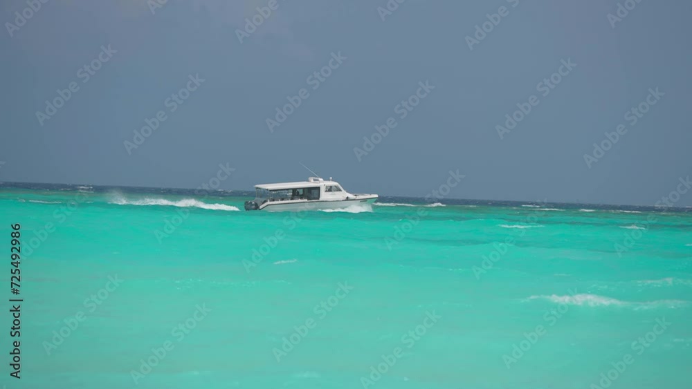 Luxury yacht cruising out at sea. Aerial view of luxury yacht cruising in turquoise lagoon. Aerial drone tracking video of luxury boat. Motor Yacht sailing on open ocean Luxury yacht cruising out at sea. Aerial view of luxury yacht cruising in turquoise lagoon. Aerial drone tracking video of luxury boat. Motor Yacht sailing on open ocean