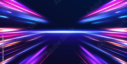 Cyberpunk light trails in motion or light slow shutter effect. Acceleration speed motion on night road. Bright sparkling background. Panoramic high speed technology concept, light abstract background.