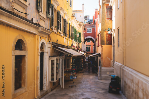 Fototapeta Naklejka Na Ścianę i Meble -  Corfu street view, Kerkyra old town beautiful cityscape, Ionian sea Islands, Greece, a summer sunny day, pedestrian streets with shops and cafes, architecture of historic center, travel to Greece