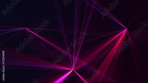 High speed laser light show on black background with flashing neon colored laser beams. This music stage performance background animation is full HD and a seamless loop. photo