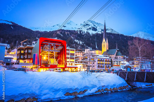 Idyllic mountain town of Davos in Swiss Alps evening view photo