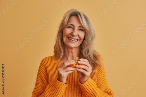 Middleaged Woman Joyfully Prioritizes Her Health By Taking Dietary Supplements. Сoncept Self-Care Rituals, Wellness Journey, Healthy Habits, Nutritional Supplements, Empowering Women