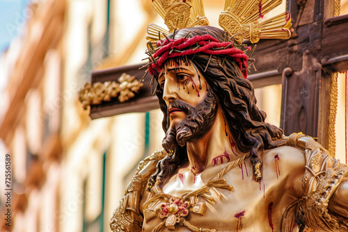statue of crucified Jesus Christ in a holy week procession photo