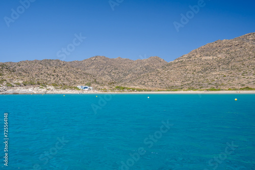 View of the most amazing turquoise beach of Tripiti, on a beautiful day on the island of Ios Greece © DIMITRIOS