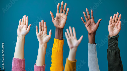 group of hands raised up