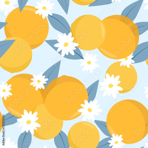 Seamless pattern of juicy oranges and blue branches with leaves and flowers