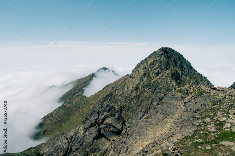 Low clouds in a valley in the French Pyrenees in France