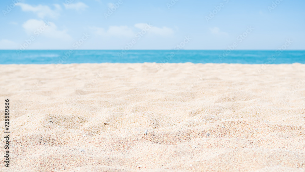 Obraz premium Sea Background Shore Blue Water White Sky Season Summer Tropical Ocean Beautiful Wave Seascape Vacation Smooth Wallpaper Island Outdoor Tropical Coast Sandy Nature Landscape Space for Travel Relax.
