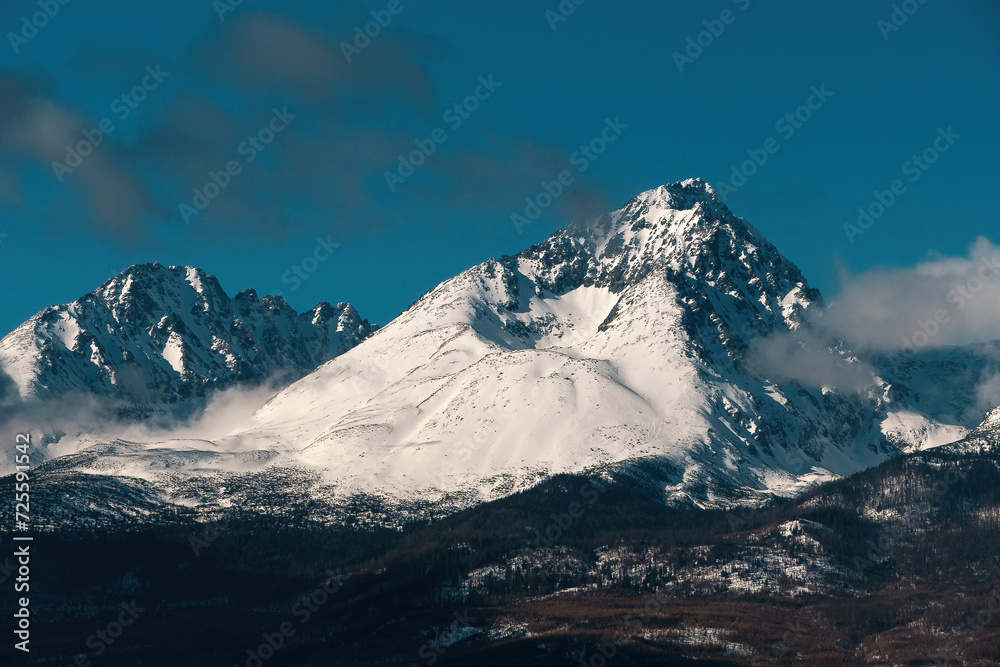 Beautiful view of snow-capped mountains against the blue sky. Gerlachovsky stit, Tatry, Slovakia