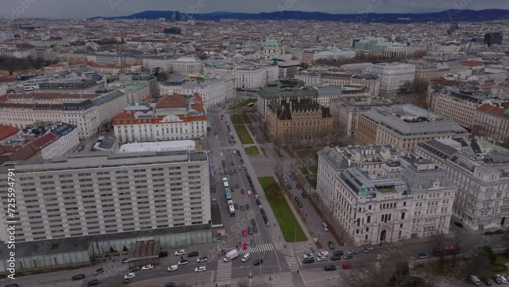Aerial view of large city on cloudy winter day. Streets and buildings in urban neighborhood. Vienna, Austria Aerial view of large city on cloudy winter day. Streets and buildings in urban neighborhood. Vienna, Austria