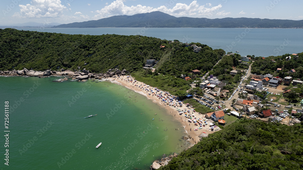 aerial image of Tainha beach in Bombinhas, coast of Santa Catarina, southern Brazil, sunny day, green sea water