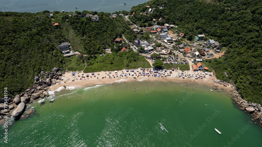 aerial image of Tainha beach in Bombinhas, coast of Santa Catarina, southern Brazil, sunny day, green sea water