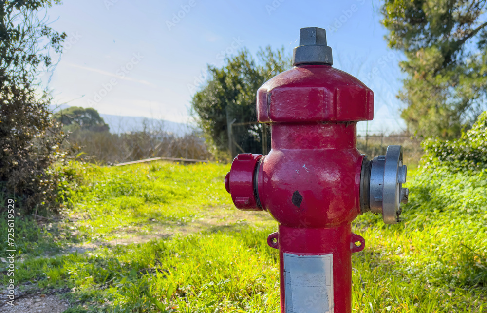 Fire fighting public system. Fire hydrant hose connection red color in Greece. Safety in extinguish. Fire fighting public system. Fire hydrant hose connection red color in Greece. Safety in extinguish.