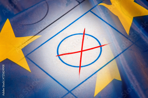 Symbolbild Europawahl: Nahaufnahme eines Wahlkreuzes vor dem Wappen der Europäischen Union photo