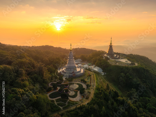 Arieal view. Twin pagoda built on top of the mountain Doi Inthanon at Chiang Mai in the North of Thailand during sunrise scene. mountain Doi Inthanon Chiang Mai of Thailand. King and Queen Pagodas.