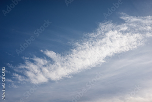 view of big sirrus cloud on blue sky background