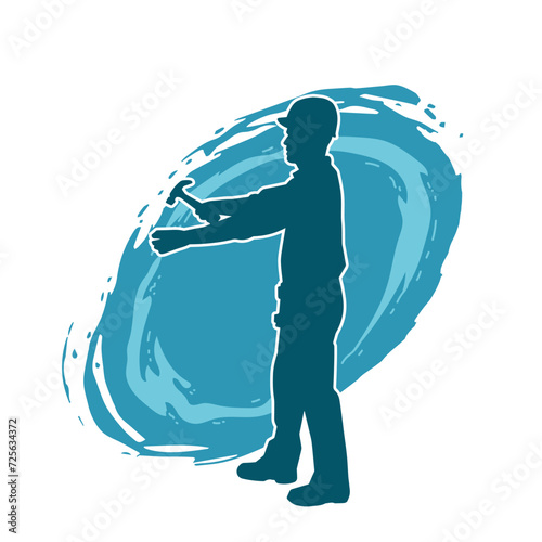 Silhouette of a worker carrying hammer tool. Silhouette of a worker in action pose using hammer tool.
