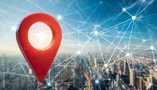 Red map pin in cityscape and network connection, indicating the city destination on the map and connection concept photo