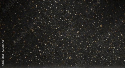 Gold glitter texture on black background. Golden glitter background. Gold glitter texture