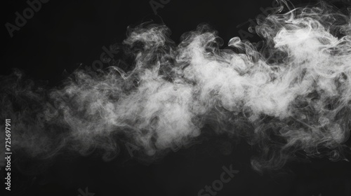 Close-up shot of smoke on a black background. Can be used to create a mysterious and dramatic atmosphere