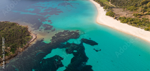 Aerial drone footage of the crystalline sea of ​​Sardinia. Tuerredda beach and white sand. photo
